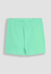 Shorts u žadnoj zelenoj boji od mekog materijala, s elastičnom gumicom u struku i jednostavnim dizajnom bez džepova ili ukrasa.