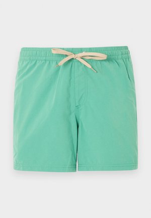 Mentaszínű fürdőnadrág bézs húzózsinórral, elasztikus derékrésszel és oldalzsebekkel, egyszínű fehér háttéren.