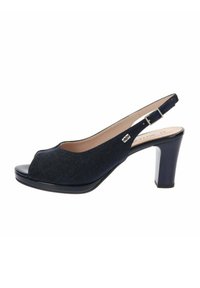Décolleté blu navy con apertura e tacco a slingback. Parte superiore in tessuto testurizzato, punta nera lucida e tacco spesso con dettagli in metallo argentato.