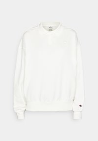 Polo bianco a maniche lunghe realizzato in tessuto morbido, con colletto classico, patta con due bottoni e logo ricamato sul petto sinistro e sulla manica.