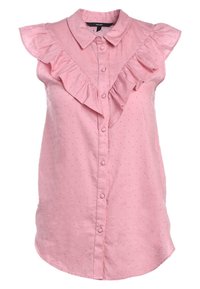 Camicia rosa chiaro a maniche corte con colletto arricciato, motivo a pois, bottoni frontali e orlo leggermente curvo. Texture liscia.