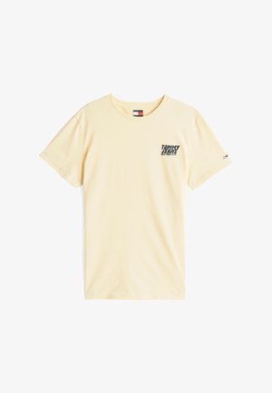 Yellow cotton T-shirt with a crew neck and short sleeves, featuring a small printed logo in black on the left chest and red, white, and blue accents.