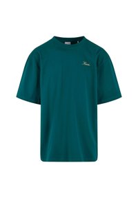 Tricou din bumbac de culoare teal, cu un croi lejer, guler rotund, mâneci scurte și logo brodat cu fir auriu pe partea stângă a pieptului. Textură netedă.