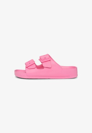 Sandalo rosa in gomma con due cinturini regolabili, suola piatta e fondo testurizzato per una migliore aderenza. Superficie liscia con bordi arrotondati.
