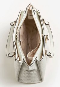 Sac à main vert clair texturé avec une fermeture éclair, doté d'un intérieur beige et de multiples compartiments pour l'organisation. Détails métalliques dorés.