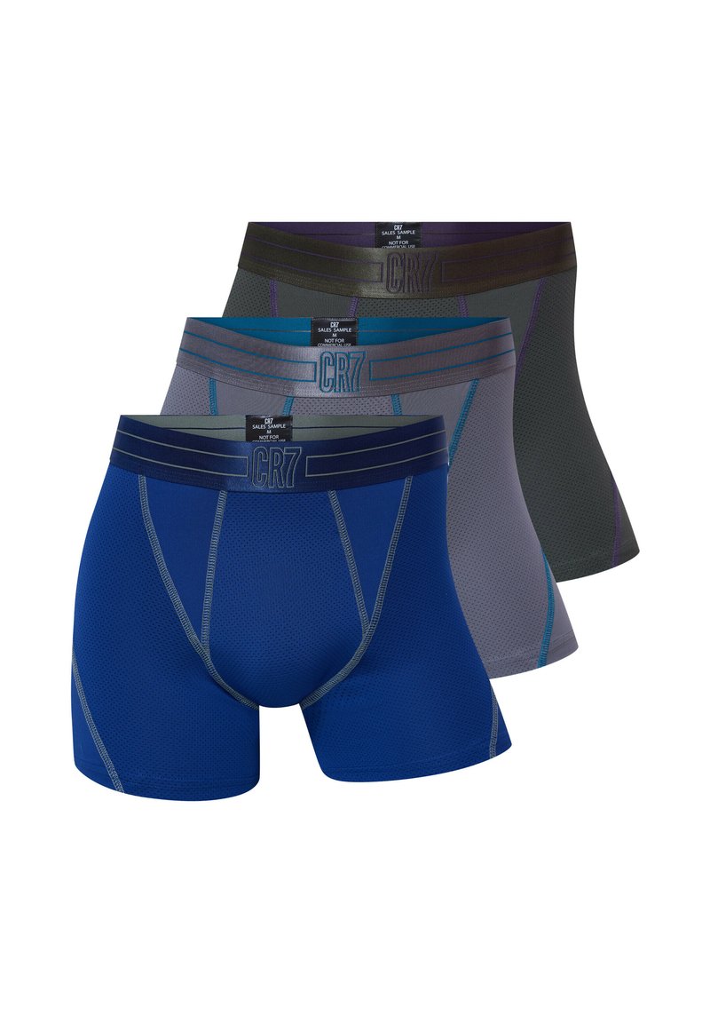 Three pairs of men's boxer briefs in blue, gray, and black, featuring a textured fabric and contrasting waistband with CR7 branding.