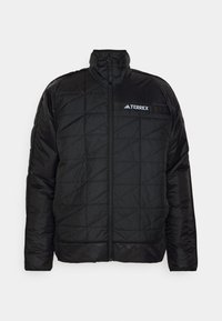 Czarna ocieplana kurtka z wysokim kołnierzem, pikowanym wzorem i zamek błyskawiczny z przodu. Posiada białe logo "TERREX" na górnej lewej części klatki piersiowej.