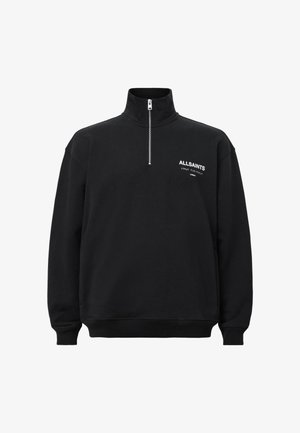 Black sweatshirt with a high collar and half zipper, featuring white printed text on the left chest. Made of cotton, soft texture.