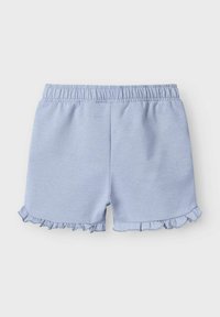 Pantalones cortos de color azul claro con una textura suave, cinturilla elástica y dobladillo con volantes. Diseñados para la comodidad y libertad de movimiento.