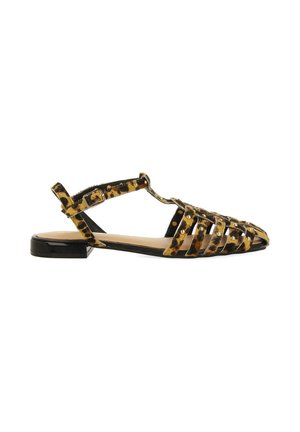 Sandal con stampa leopardata nera e gialla, con tacco piatto, punta aperta e cinturino alla caviglia sicuro, con dettagli metallici.