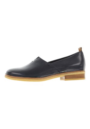 Dark navy leather slip-on shoe with a low wooden heel and a subtle stitched detail across the front panel. Textured rubber sole.