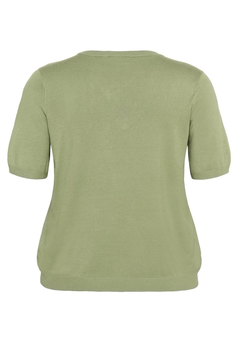 Krótki rękaw, jasnobiały sweter w kolorze jasnozielonym z okrągłym dekoltem, o miękkiej fakturze i luźnym kroju, z subtelnym ściągaczem na dolnym brzegu i rękawach.