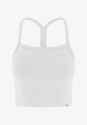 Hvid cropped tanktop med tynde skulderstropper og Y-formet rygdesign, lavet af ribbet stof med et lille logotag.