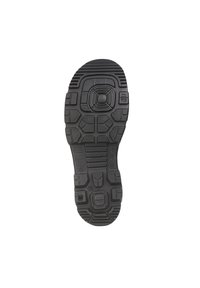Black shoe sole with a textured surface, featuring a geometric tread pattern, varying thickness, and a circular central design.