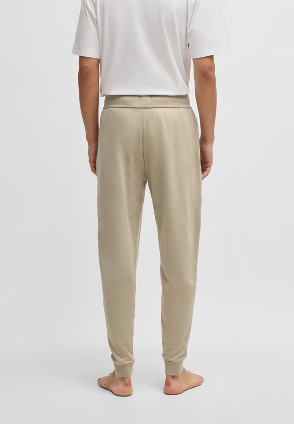AUTHENTIC - Tracksuit bottoms - light beige3