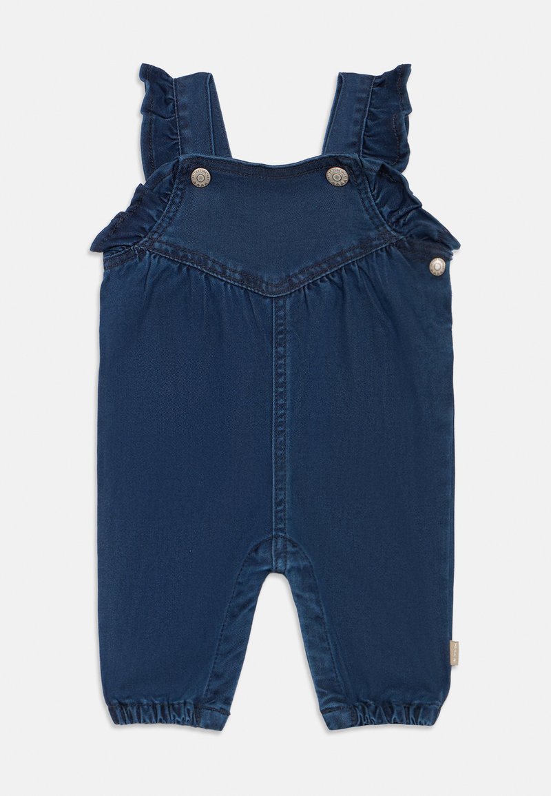Salopette di denim blu navy con spalline arricciate, dettagli in metallo sui bottoni e aperture elasticizzate sulle gambe per una vestibilità comoda.