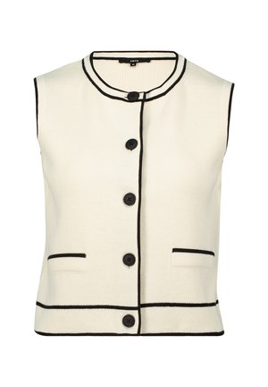 Gilet sans manches crème avec bord noir, présentant un col rond, six boutons et deux poches devant. Tissu tricoté texturé.