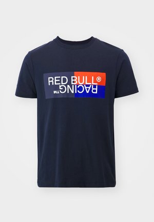 Mornarsko modra bombažna majica s kratkimi rokavi, ki ima pravokotni logotip v rdeči, modri in beli barvi z napisom "RED BULL RACING", okrogel izrez.