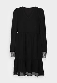 Black dress with long sleeves, V-neck, tiered skirt, and lace detail at the sleeve cuffs. Made from a flowing fabric, semi-sheer hem.