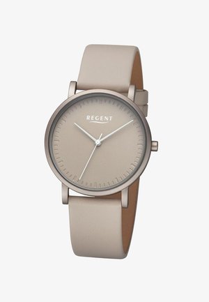 Montre analogique beige avec cadran simple, aiguilles blanche pour les heures, les minutes et les secondes, et bracelet en cuir beige, marque "REGENT" visible.