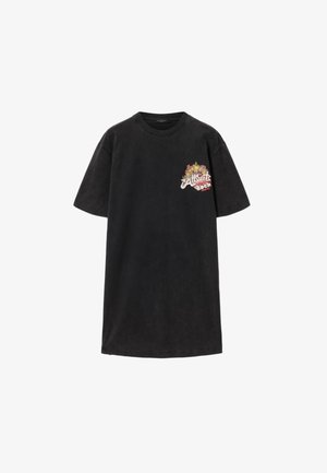 Zwarte oversized T-shirt met kleurrijke bloemengrafiek en de tekst "AllSaints Rock Festival" op de linkerborst.