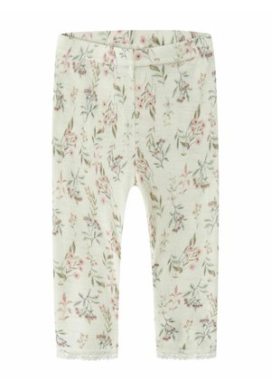 Kremfarvede babylegginger med pink og grøn blomstermønster samt blonderkant ved anklerne.