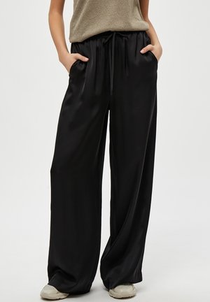 KAMIA - Trousers - black