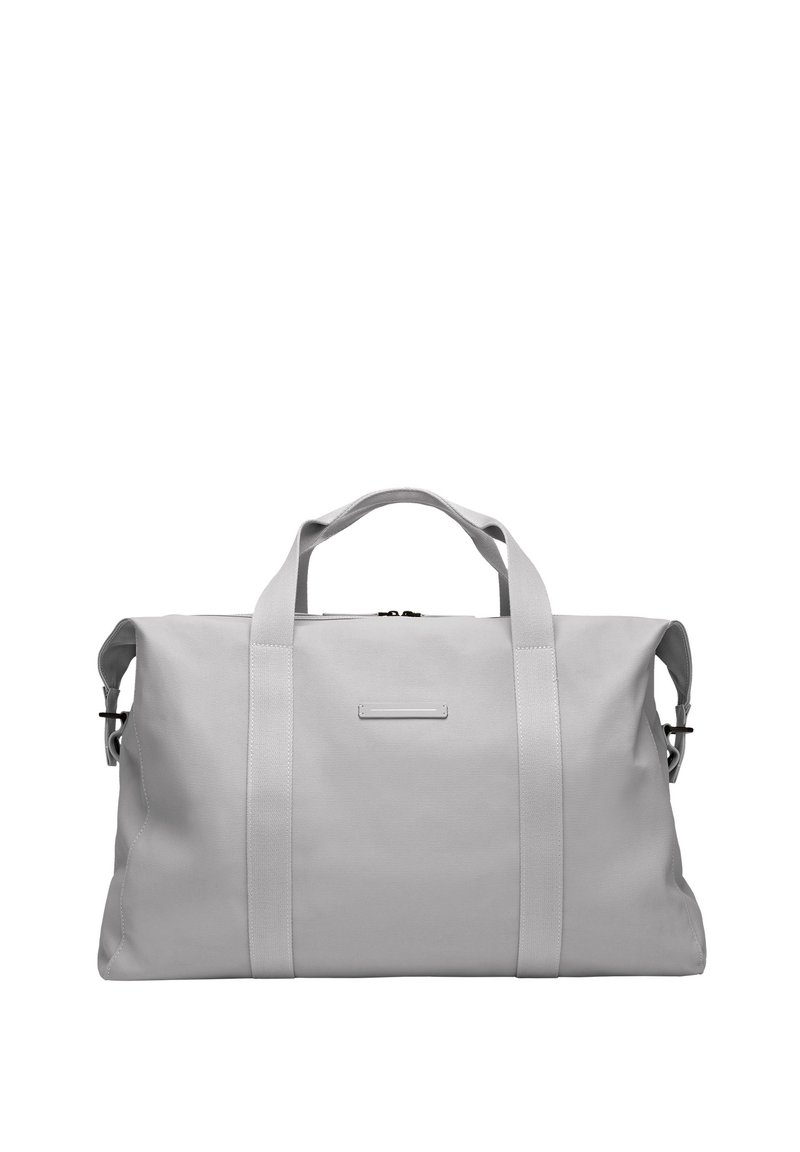 SAC EN TOILE GRIS DURABLE : Ce sac de sport en toile grise est doté de deux poignées supérieures et d'une bandoulière amovible. Son design simple est agrémenté d'un panneau accent horizontal.