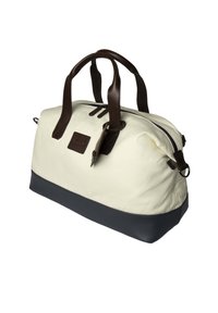 Borsa a duffel in tela con dettagli in pelle scura, corpo di colore crema e fondo blu navy. Presenta manici doppi e una chiusura con zip.