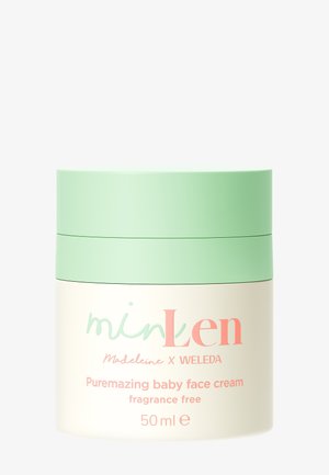 Minzgrüne und cremefarbene Dose der duftfreien Puremazing Baby-Gesichtscreme, 50 ml, Zusammenarbeit zwischen Madeleine und Weleda.
