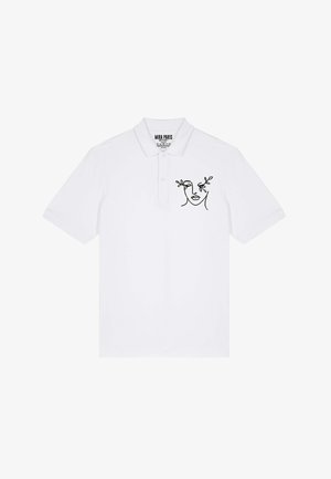 Polo bianco a maniche corte, con un disegno a linea nera di un volto sulla parte sinistra del petto. Realizzato in cotone. Collo classico con bottoni.