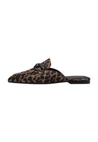 Leopard print suede mules with a pointed toe, flat sole, and a black circular hardware accent. Slip-on design with open back.