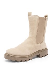 Light beige suede mid-calf boot with elastic side panel, pull tabs on shaft, and chunky rubber sole with deep treads.