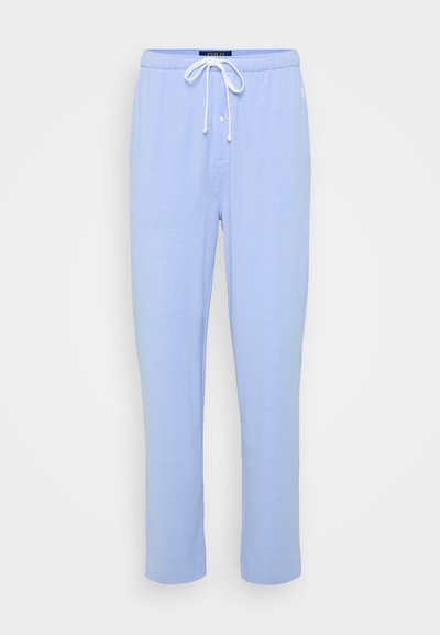 Calças jogger em algodão de tom azul claro, com cintura elástica, cordão e detalhe de botão na frente. Textura suave e design de perna reta.