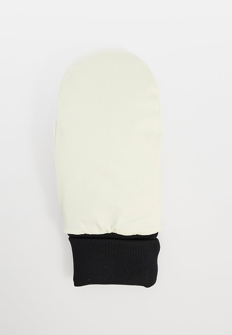 Mitaine de couleur crème avec un poignet côtelé noir. Conçue en tissu lisse avec une forme arrondie, offrant une couverture complète de la main.