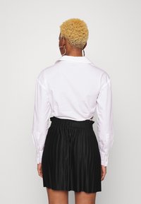 Even&Odd Petite Minissaia - black