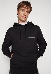 Calvin Klein Jeans INSTITUTIONAL HOODIE - Sweatshirt - black