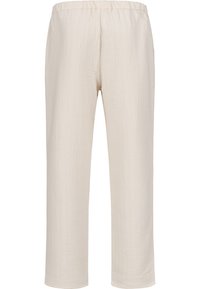 Pantalon texturé léger crème avec une taille élastique et une coupe droite. Pas de poches ni de boutons visibles.