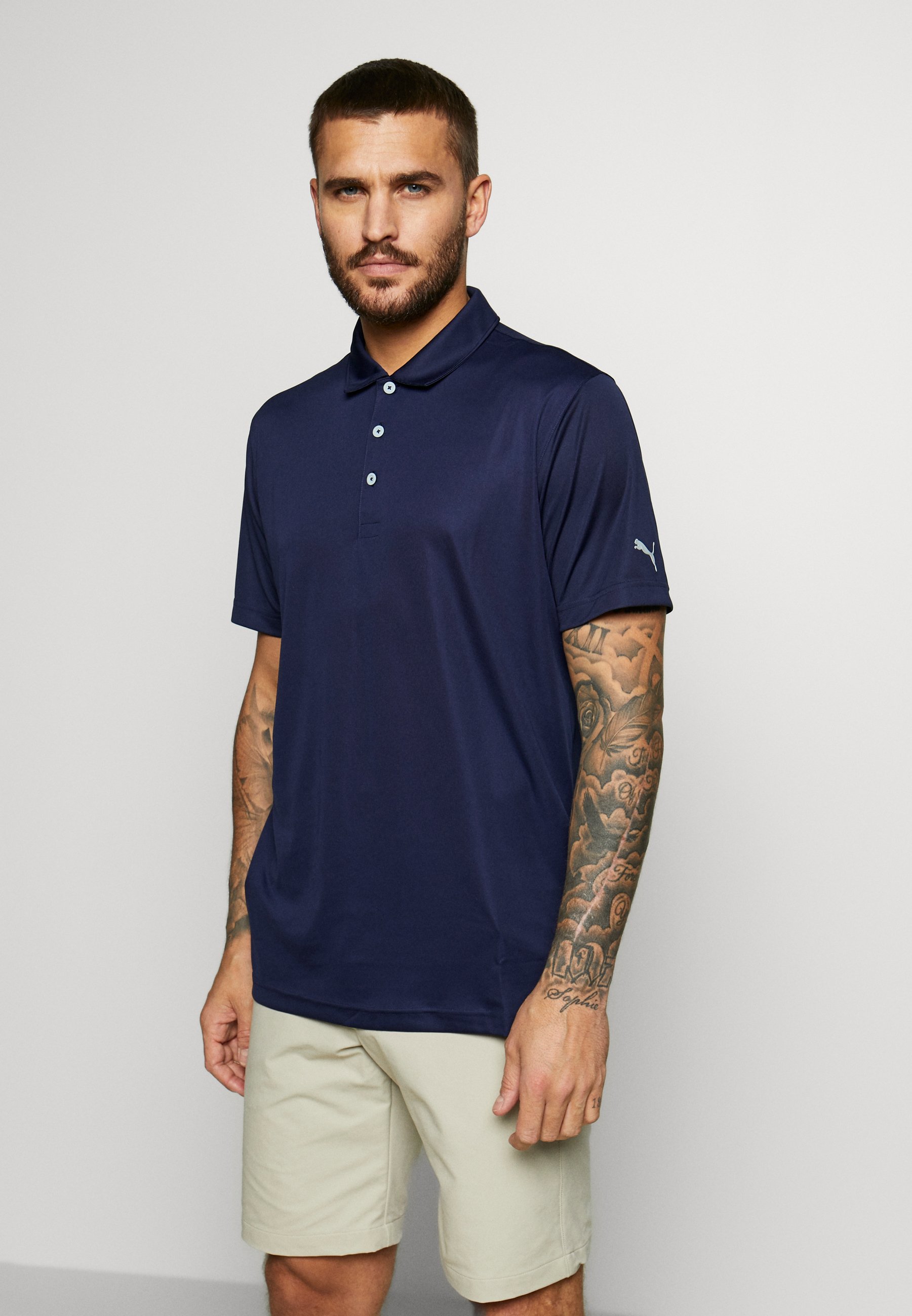 peacock golf shirt