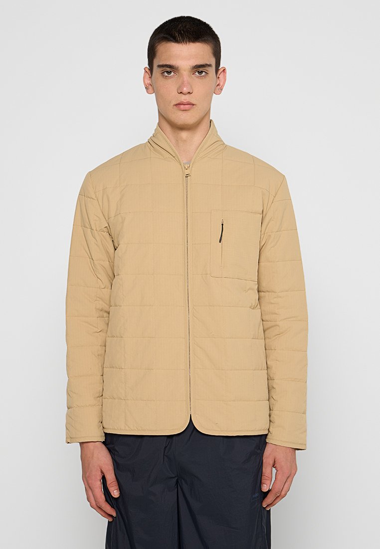 Rains Jas zandkleur Rains Jas zandkleur