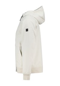 Giacca leggera color crema con cappuccio, tasche con zip, polsini elastici e un tessuto testurizzato. Presenta un piccolo logo sulla manica.