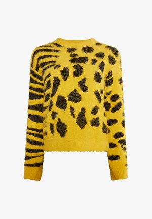 Geltona megztinis su juodais tigro dryželiais ir leopardų rašto $neška. Pūkuota tekstūra, apvali iškirptė ir ilgos rankovės.