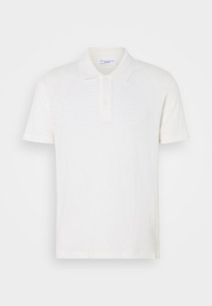 White polo shirt made of soft cotton, featuring a classic collar, two-button placket, and subtle branding on the chest.