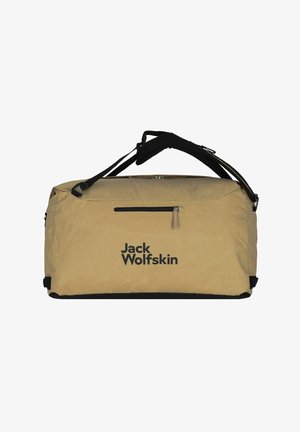 Bolsa de viaje Jack Wolfskin beige con un bolsillo frontal con cremallera y correas de hombro ajustables negras sobre un fondo blanco.