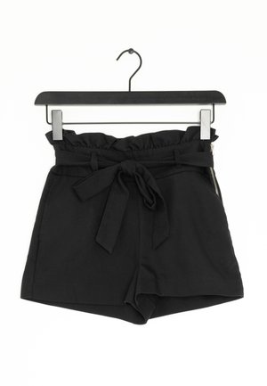 Schwarze Shorts mit einem Rüschensaum, gebundenem Gürtel und seitlichem Reißverschluss. Hergestellt aus glattem Stoff mit taillierter Passform.