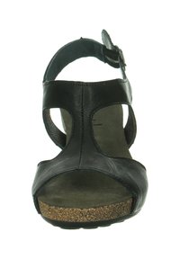 Schwarze Leder-Sandale mit offener Zehe und Knöchelriemen, mit durchbrochenem Design und Korksohle für zusätzlichen Komfort.