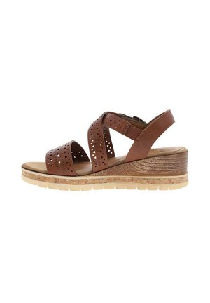 Sandale compensée en cuir marron avec des brides croisées perforées et une bride arrière ajustable, semelle plateforme à texture de liège.