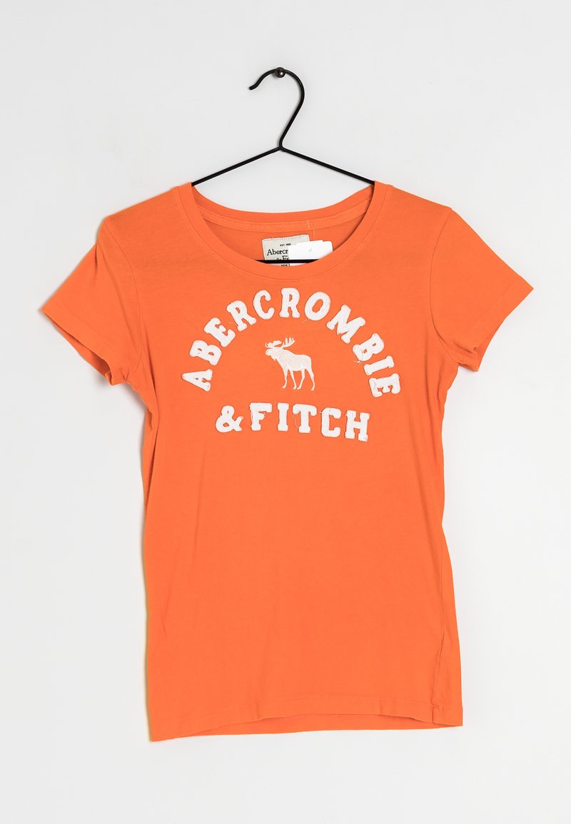 Orange cotton t-shirt featuring a white graphic text "ABERCROMBIE & FITCH" and a moose design, short sleeves, and a round neckline.