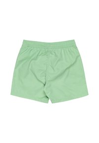 Pantaloni da bagno verdi realizzati in un tessuto leggero e morbido. Presentano una vita elasticizzata e un design semplice senza ulteriori motivi o dettagli.
