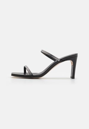 CANNES GLOW - Pantolette hoch - glow black